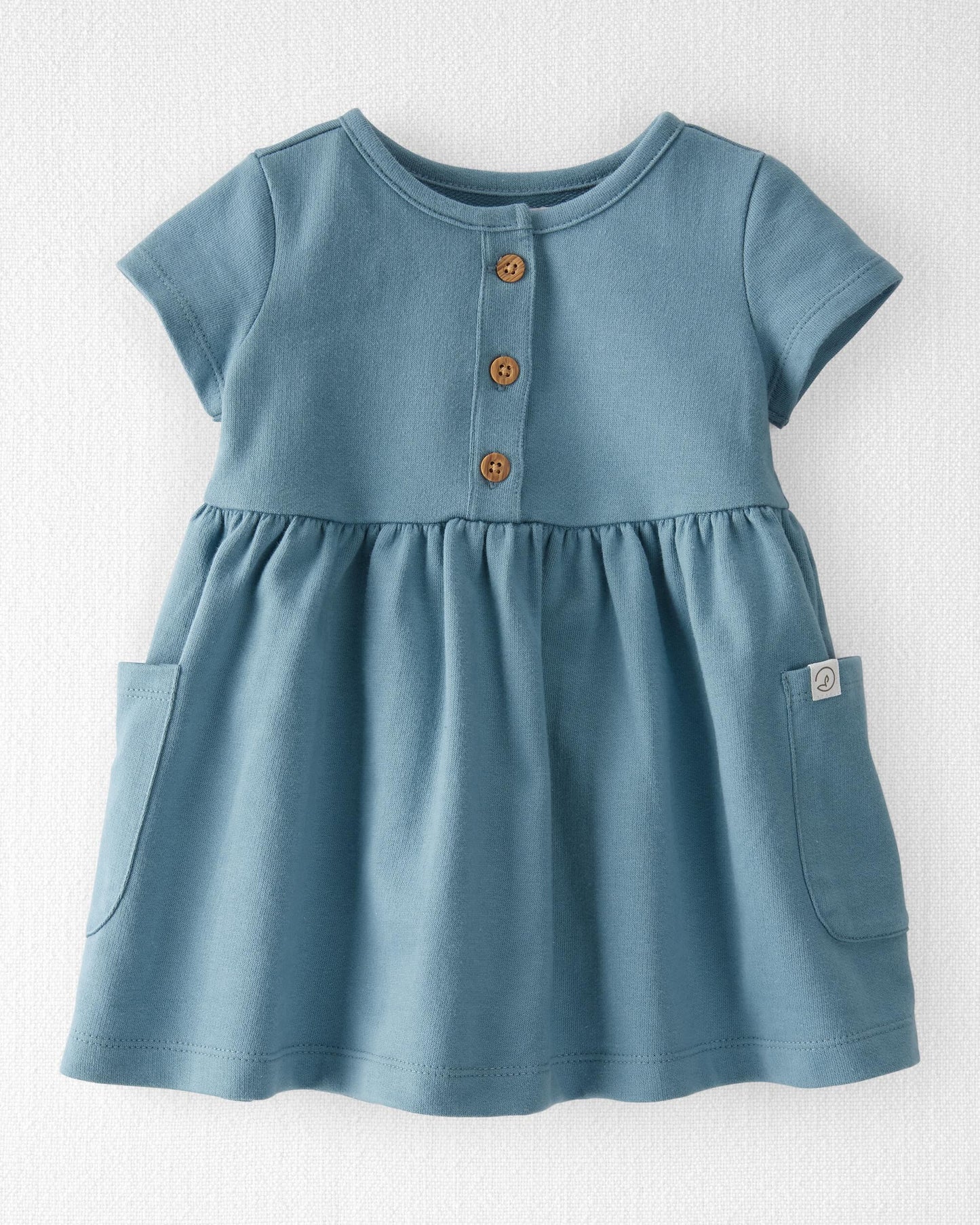 Vestido de bolsillo de algodón orgánico para bebé